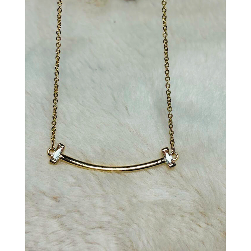 16 inch gold curved bar necklace with CZ stones