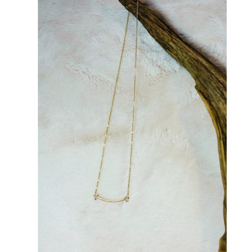 16 inch gold curved bar necklace with CZ stones