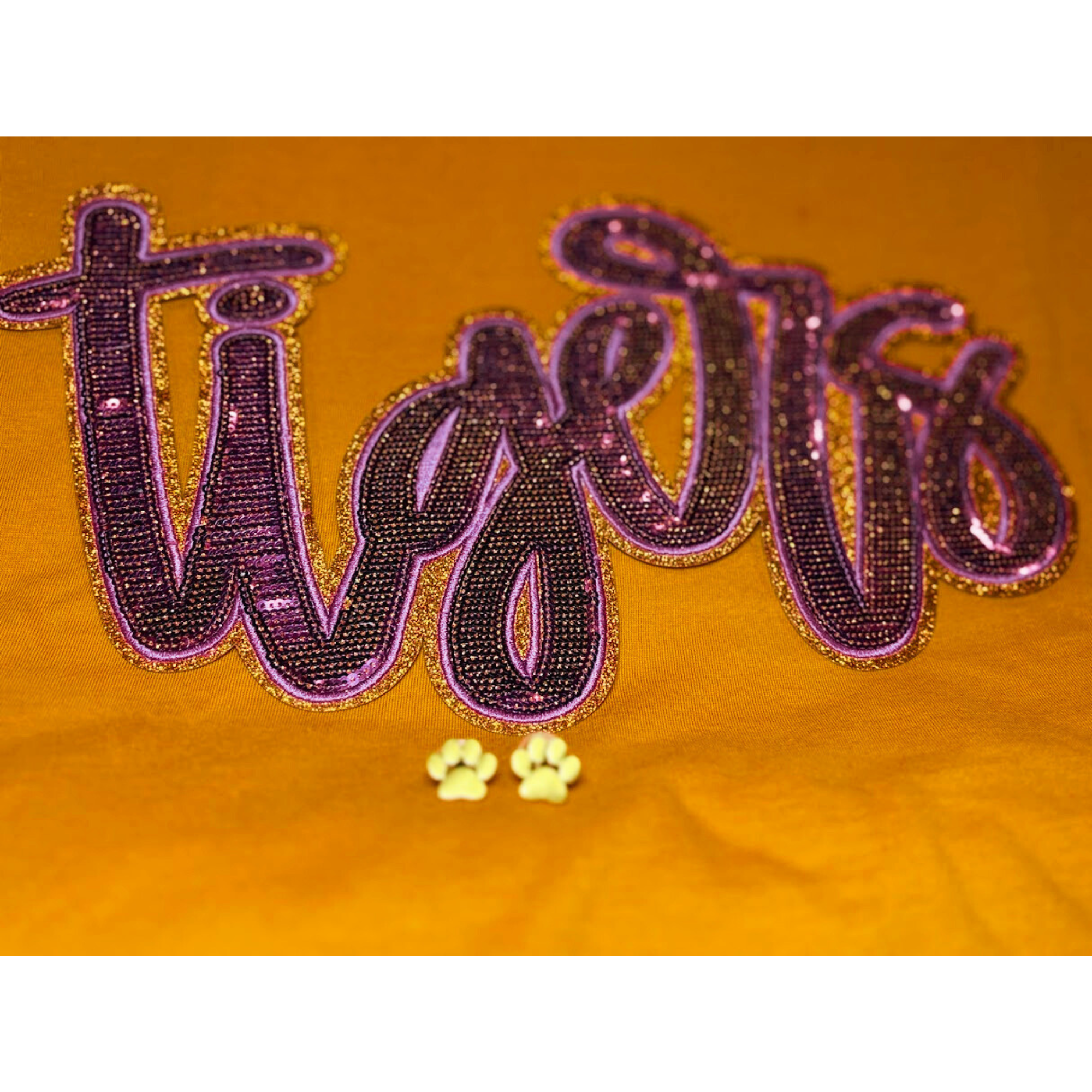 Brushed gold paw stud earrings