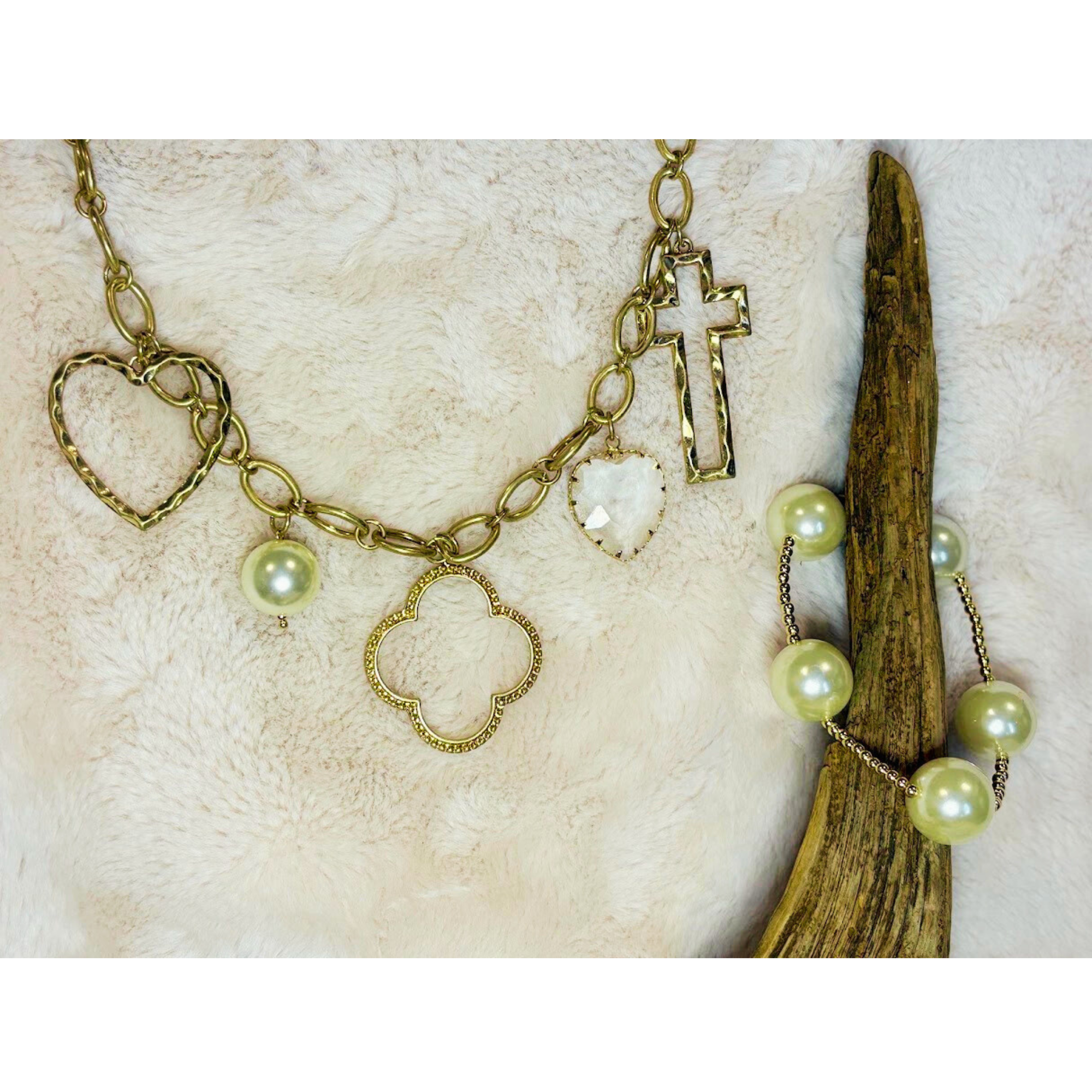 17 inch gold necklace with pearl, heart, clover and cross charms