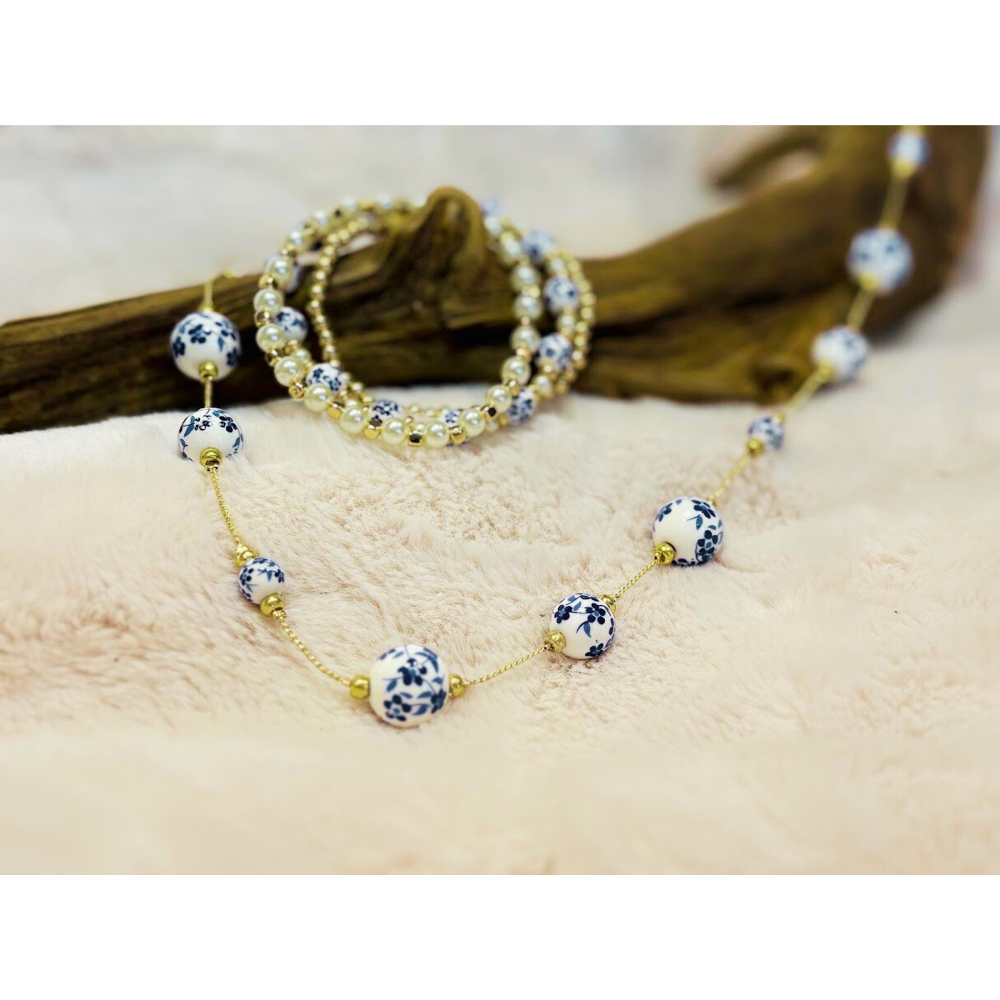 33 inch gold tone necklace with white and blue cottage core beads