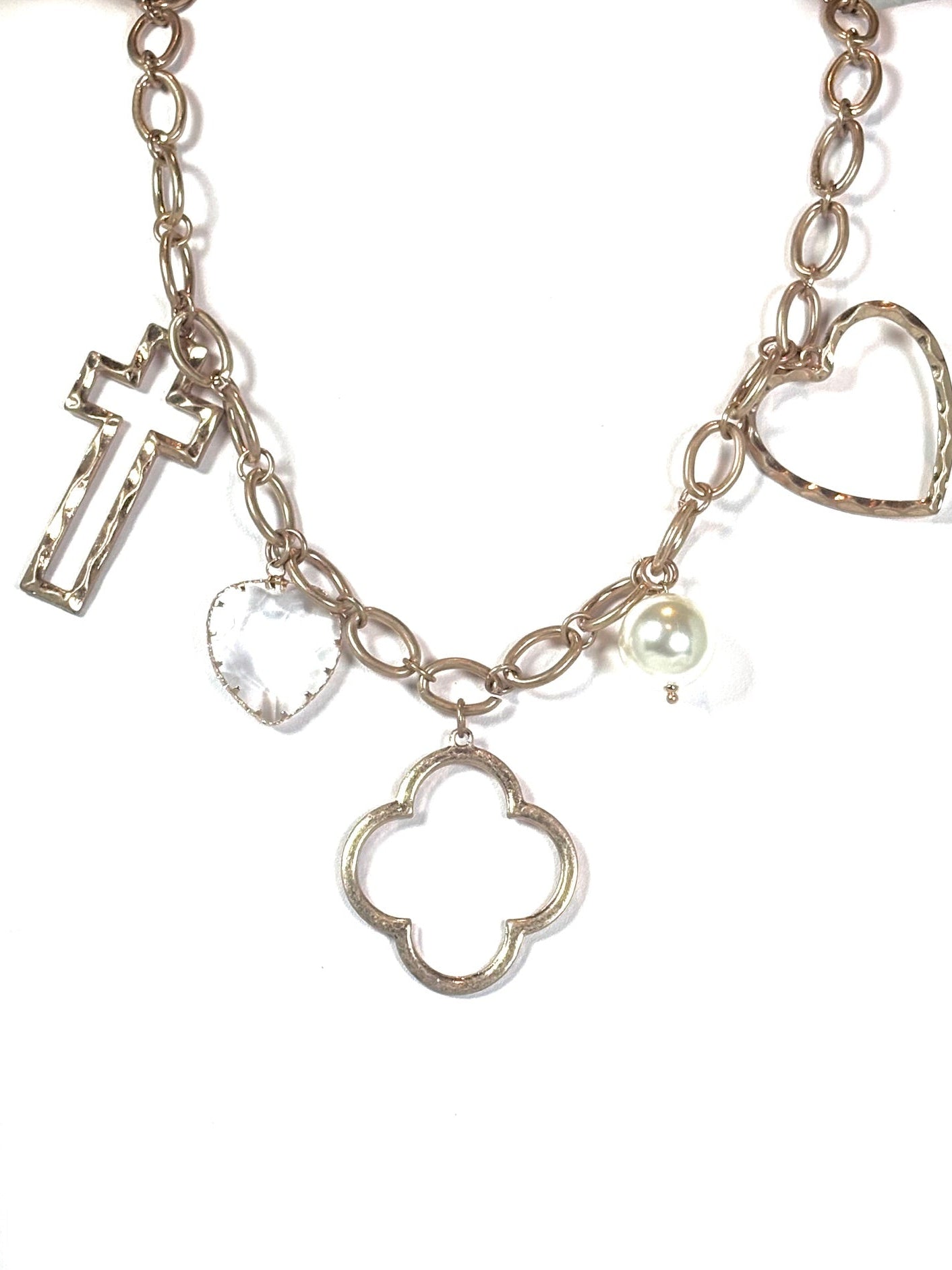 17 inch gold necklace with pearl, heart, clover and cross charms