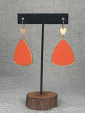 Gold dangle with orange leather drop earrings