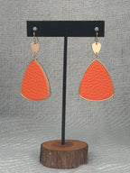 Gold dangle with orange leather drop earrings