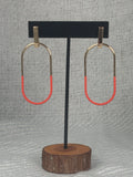 Orange dipped gold oval dangle earrings