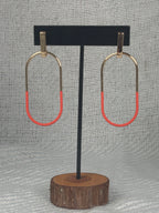 Orange dipped gold oval dangle earrings