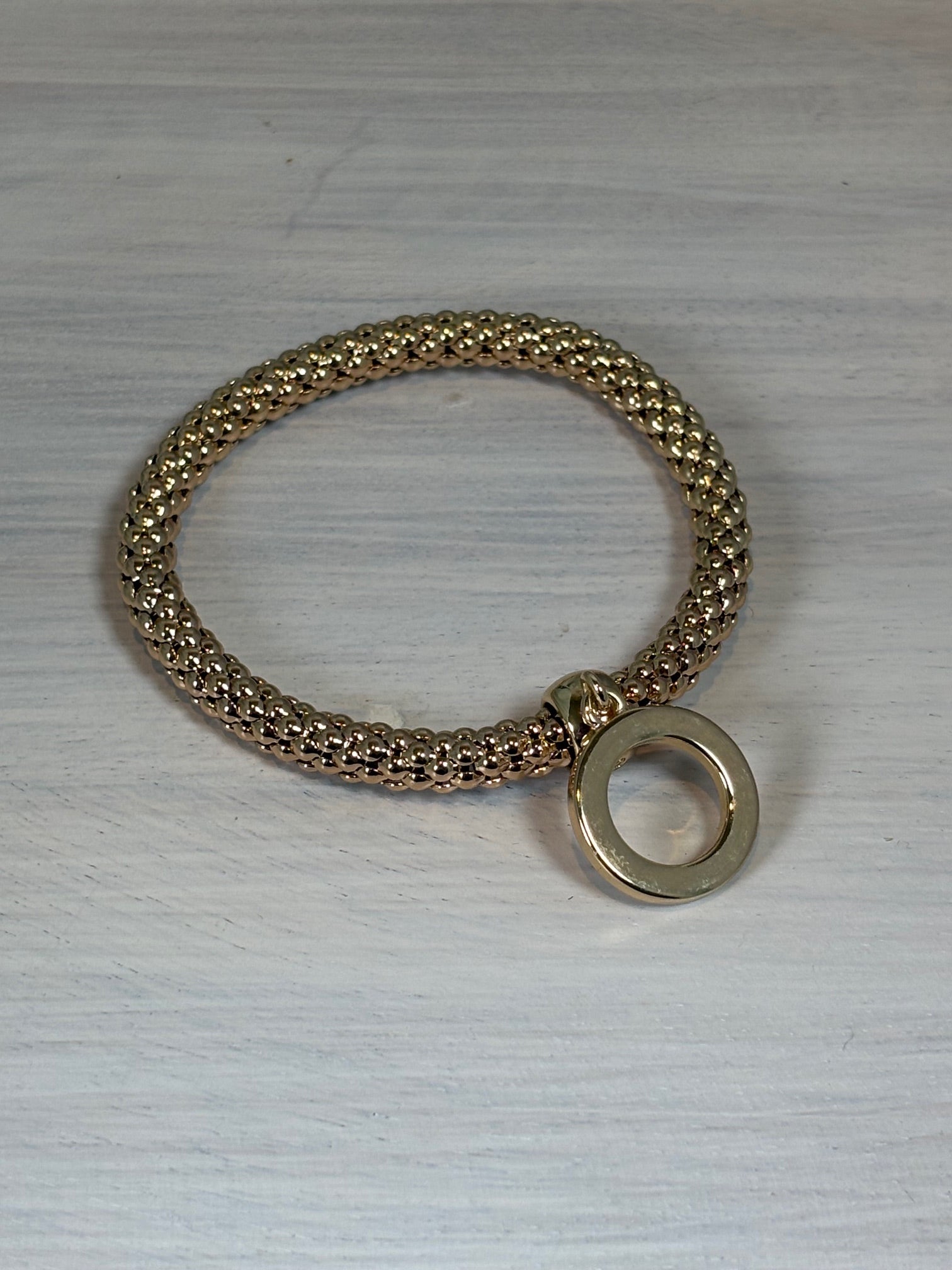 Gold Stretch Bracelet with Gold Circle
