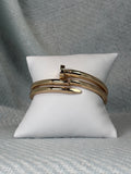 Nailed It gold hinged bangle