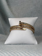 Nailed It gold hinged bangle