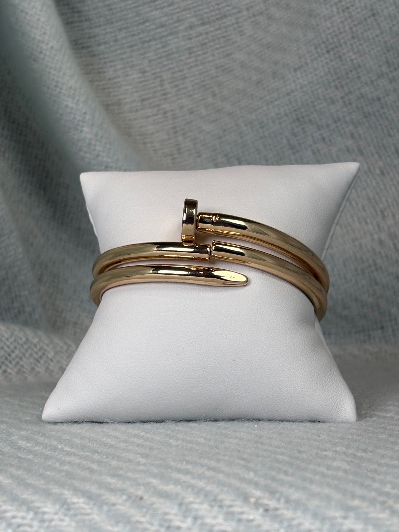 Nailed It gold hinged bangle
