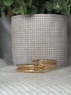 Nailed It gold hinged bangle