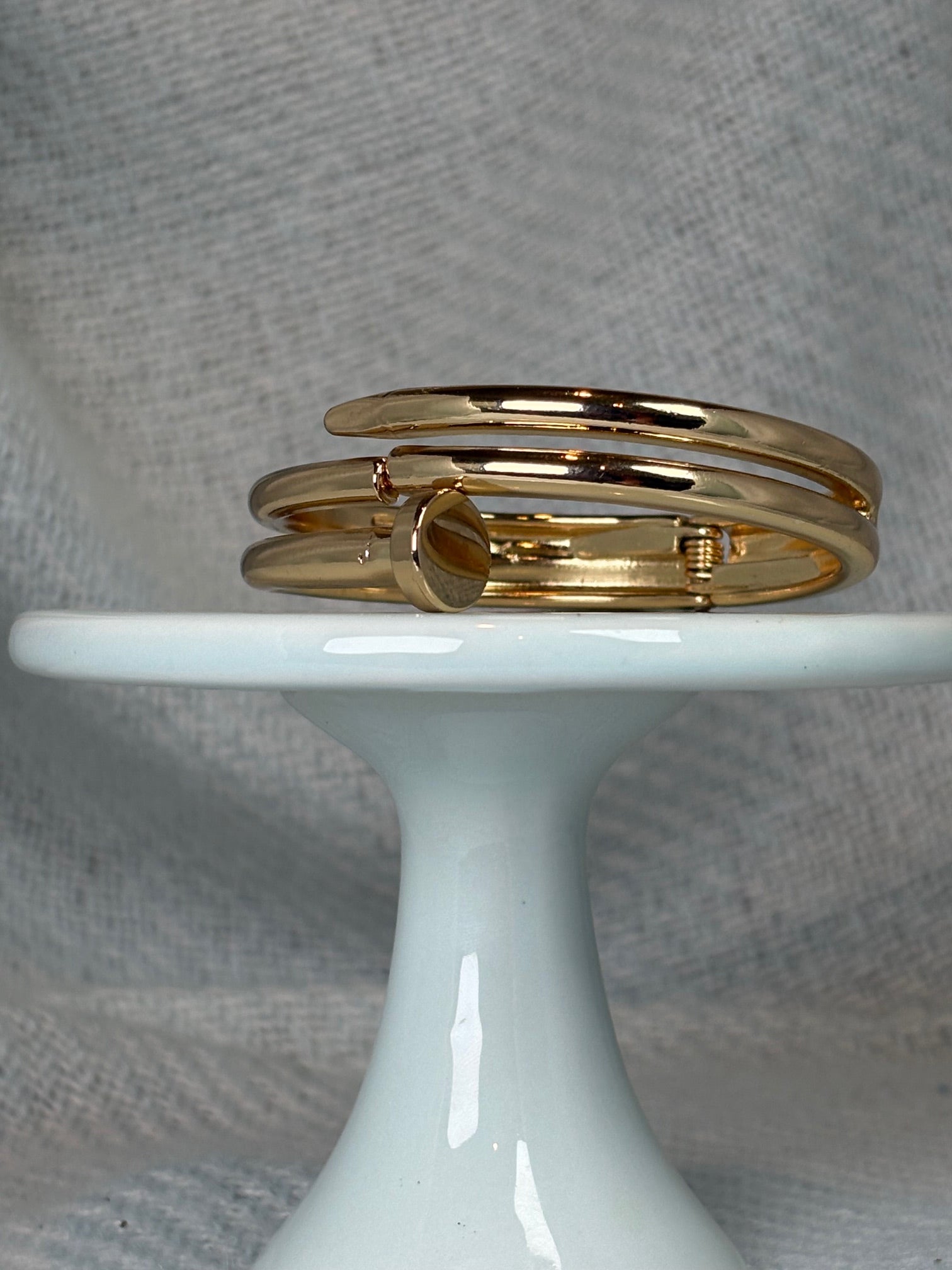 Nailed It gold hinged bangle